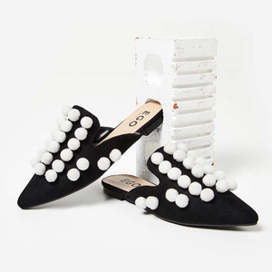 Clio White Pom Pom Flat Mule In Black Faux Suede
