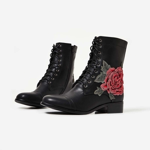 Kaddy Floral Embroidered Ankle Boot In Black Faux Leather