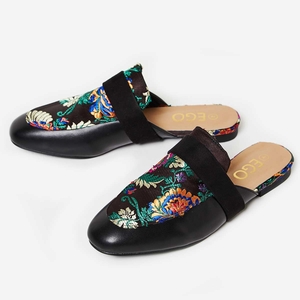 Ria Black Floral Embroidered Flat Mule In Black Faux Leather