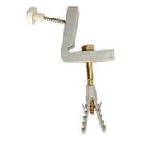 WC Pan To Floor Kit - Side Fixing - WC Pan To Floor Kit - Side Fixing - Contents: 2 x S10 nylon plugs,  2 x 7x65 hex screws,  2 x washers,  2 nylon bushes,  2 x 5x30 brass screws,  2 x nylon angle brackets,  2 x flat white caps