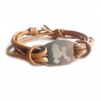 PROTECTION bracelet- poodle symbol- engraved melchior pendant on leather cord