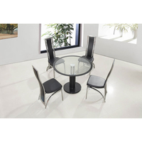 Coma Round Black Border Dining Table And 4 Dining Chairs