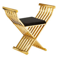 Fafnir Cross Design Occasional Chair With Black Seat In Gold