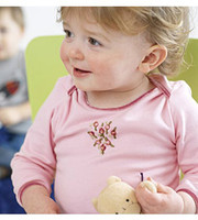 Pink long sleeve baby body