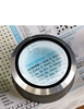 MAGNIFIED AND LIGHT-UP PAPER-WEIGHT