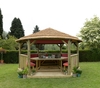 Forest Garden 4.7m Hexagonal Wooden Garden Gazebo with Thatched Roof - Furnished with Table,  Benches and Cushions (Terracotta)