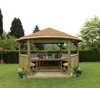 Forest Garden 4.7m Hexagonal Wooden Garden Gazebo with Thatched Roof - Furnished with Table,  Benches and Cushions (Cream)