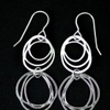 Double sketch dangly earrings
