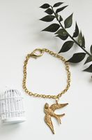 Gold Bird Bracelet - a beautiful and detailed golden swallow bird charm hanging from a thick link chain: nature inspired,  OOAK
