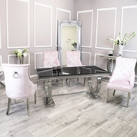 alto black glass dining table with 8 dessel pink chairs