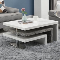 design rotating white gloss coffee table in melange marble effect