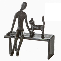 devotion iron design sculpture in burnished bronze