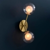 easton clear ribbed and frosted glass wall light in satin brass