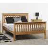 merlin wooden high foot double bed in oak