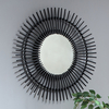 santol starburst wall mirror in black rattan frame