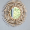 santol starburst wall mirror in natural rattan frame