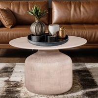 venice cane and mango wood round coffee table in natural