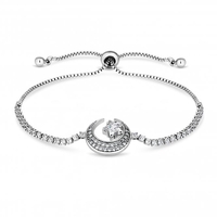Rhodium Plated Cubic Zirconia Star And Moon Toggle Bracelet