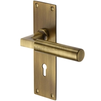 Heritage Brass Bauhaus Door Handle On Flat Lock Plate Antique Brass