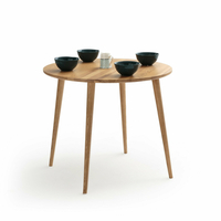 Crueso Round Ash Dining Table (Seats 4)