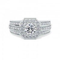 A magnificent round brilliant cut cluster style diamond ring in platinum