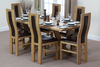 6ft x 3ft Solid Oak Crossed Leg Dining Table + 6 Curved Back Brown Leather Chairs