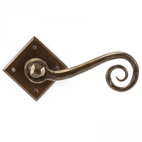 Bronze Blacksmith Monkeytail Lever Door Handle on Diamond Rosette