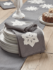 Four Embroidered Snowflake Napkins